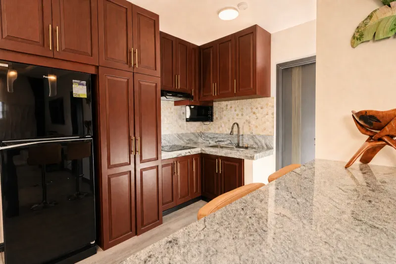 Hardwood kitchen with marble countertops
