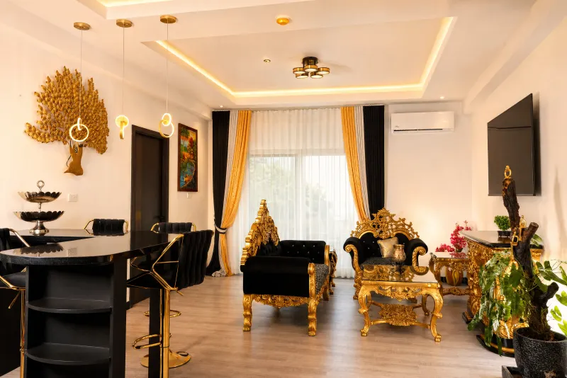 Living room with gold-leaf carved furniture